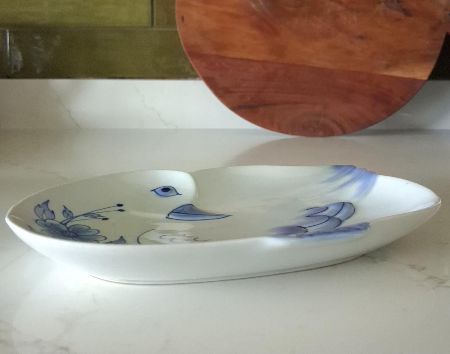 Blue and white floral duck shaped plate