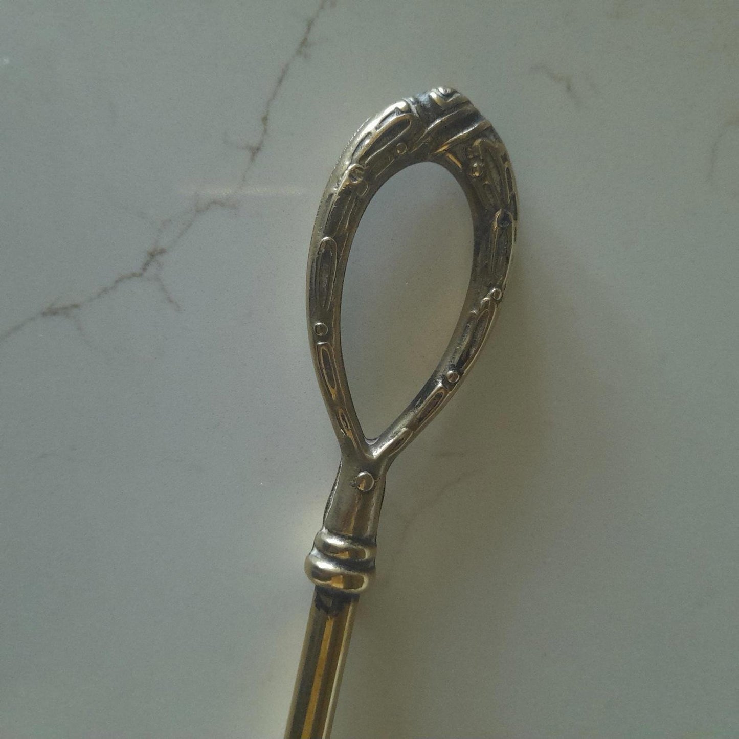 Long brass fireside hanging toasting fork
