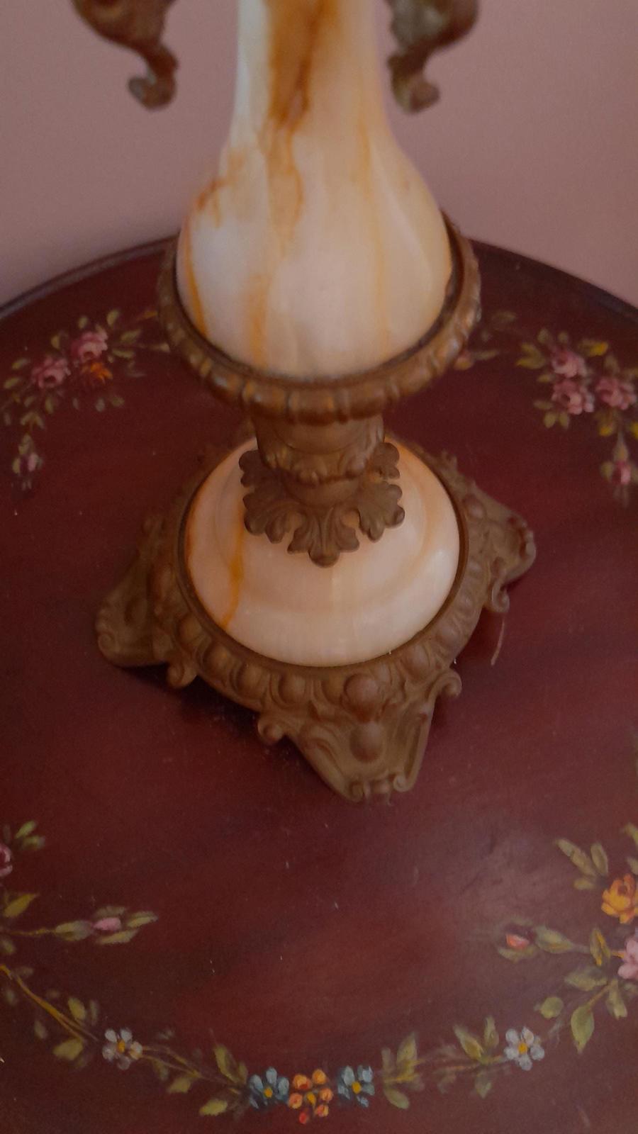 Brass and marble 4 arm candelabra with a central candleholder.