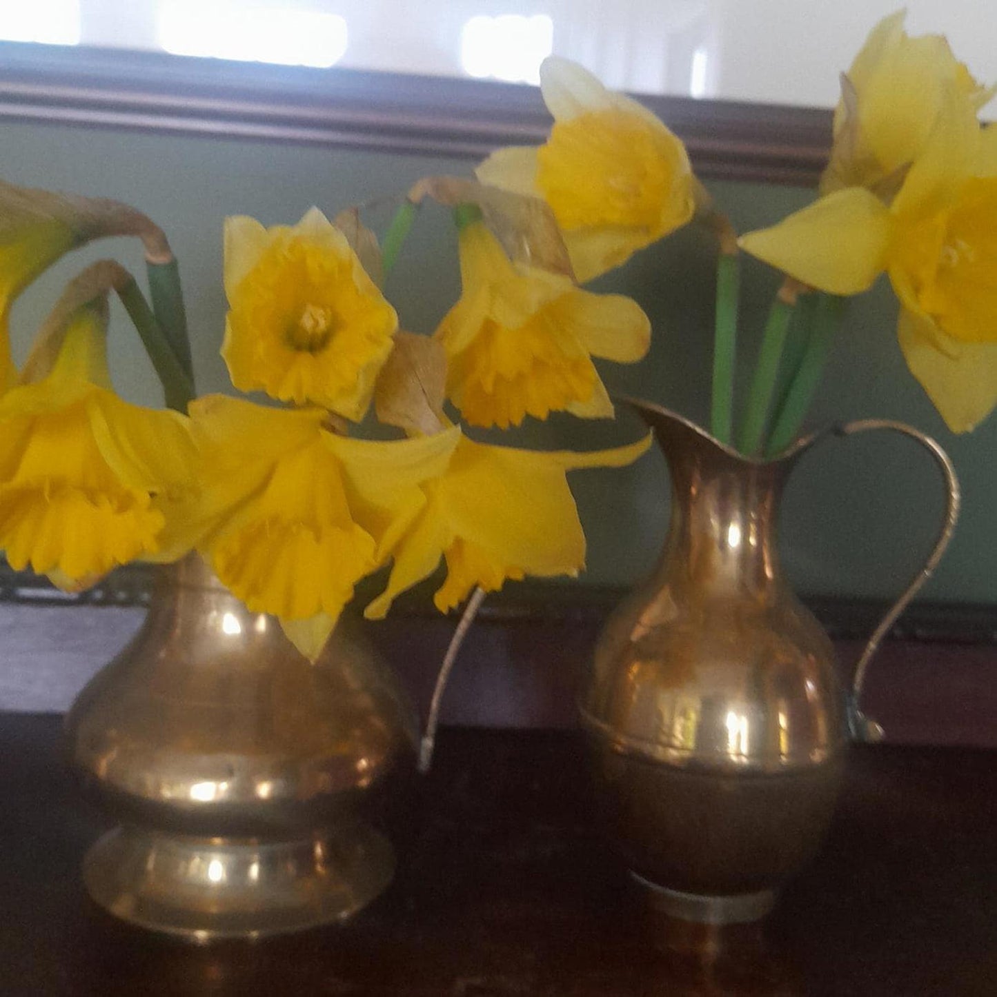 A pair of small brass jugs 5" tall