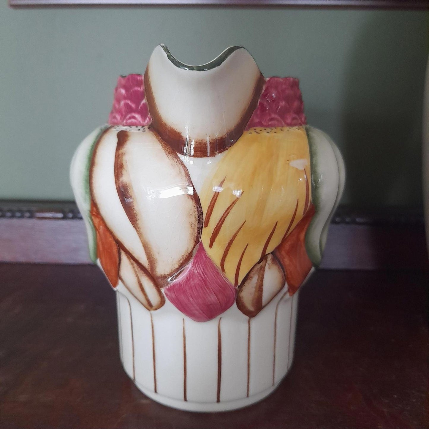 A pair of Art Deco style H. J Wood Ltd Burslem handpainted jugs.