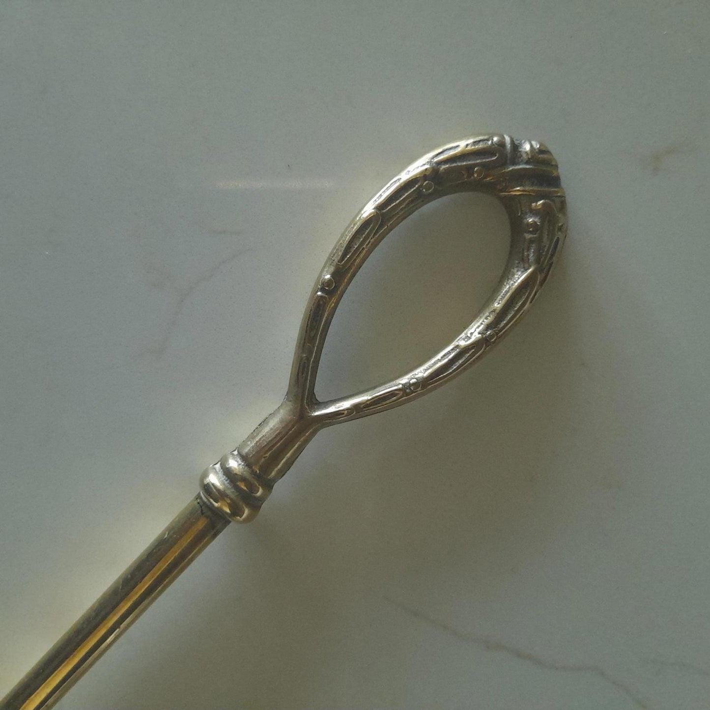 Long brass fireside hanging toasting fork
