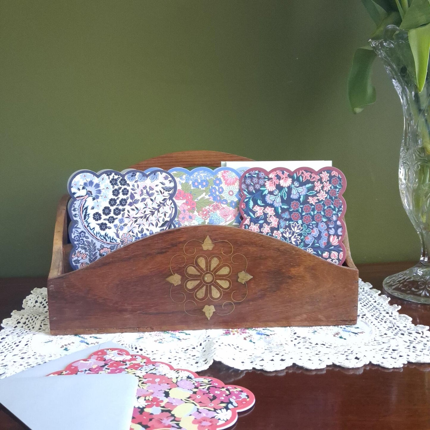 Wooden letter holder with floral brass inlay