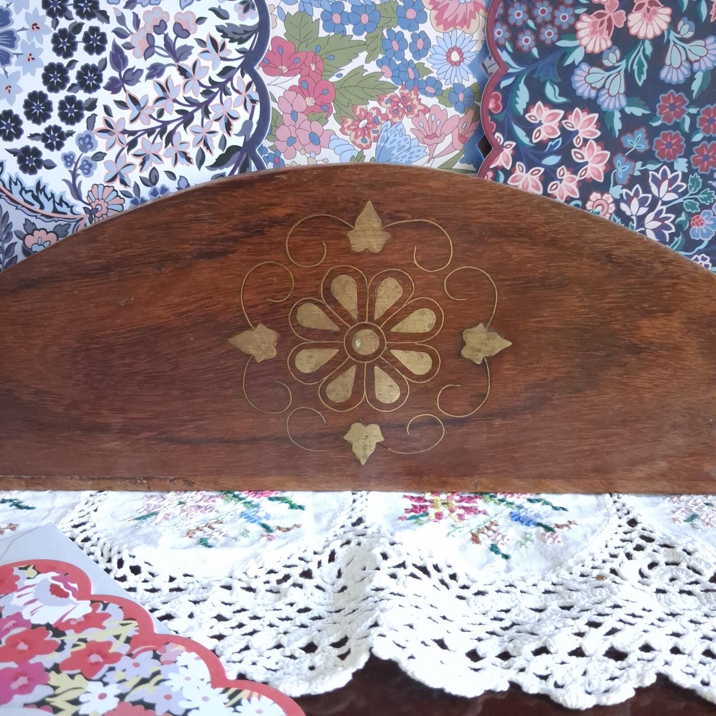 Wooden letter holder with floral brass inlay