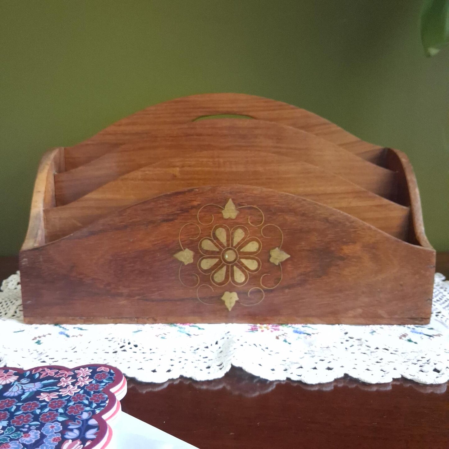 Wooden letter holder with floral brass inlay