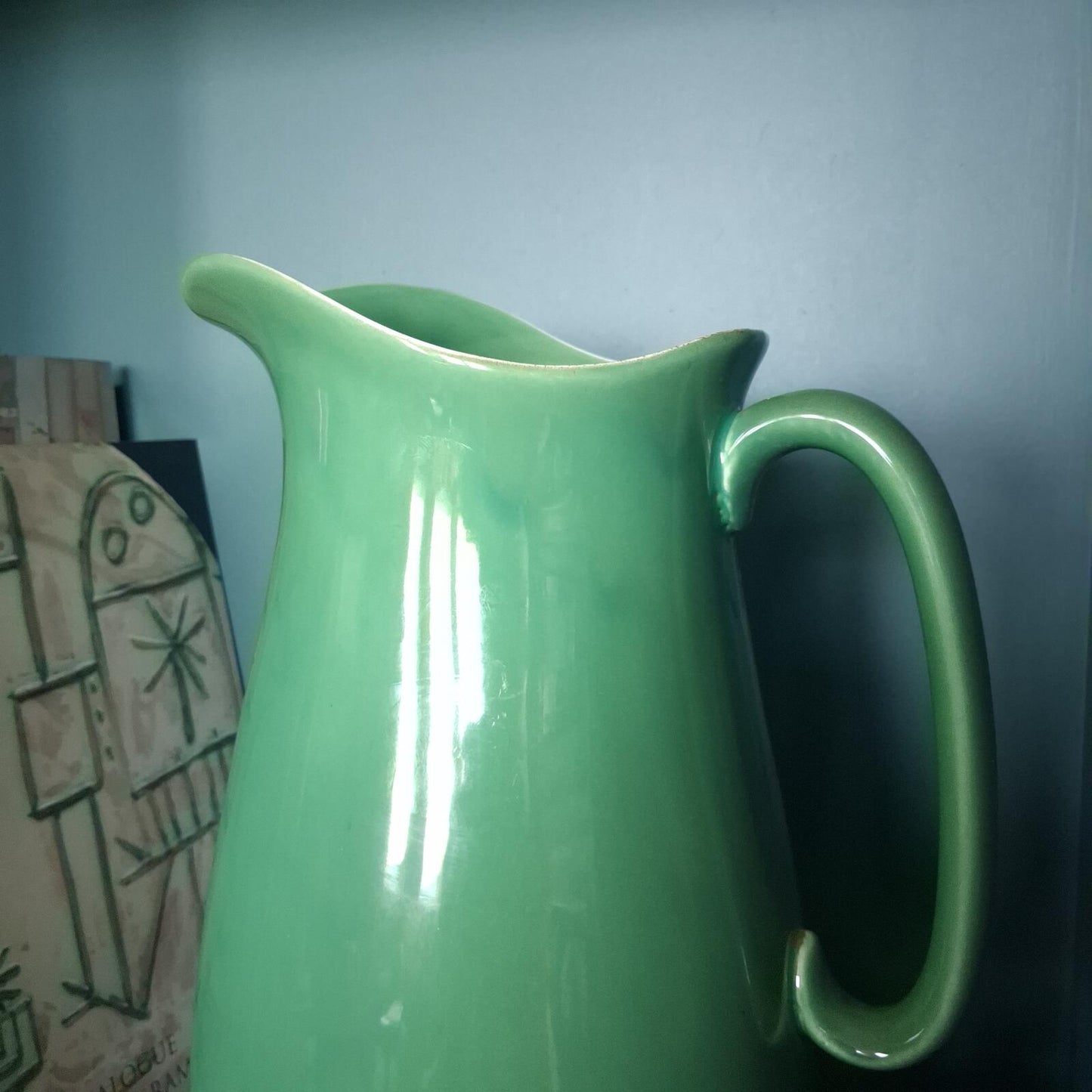 Large vibrant green pottery pitcher