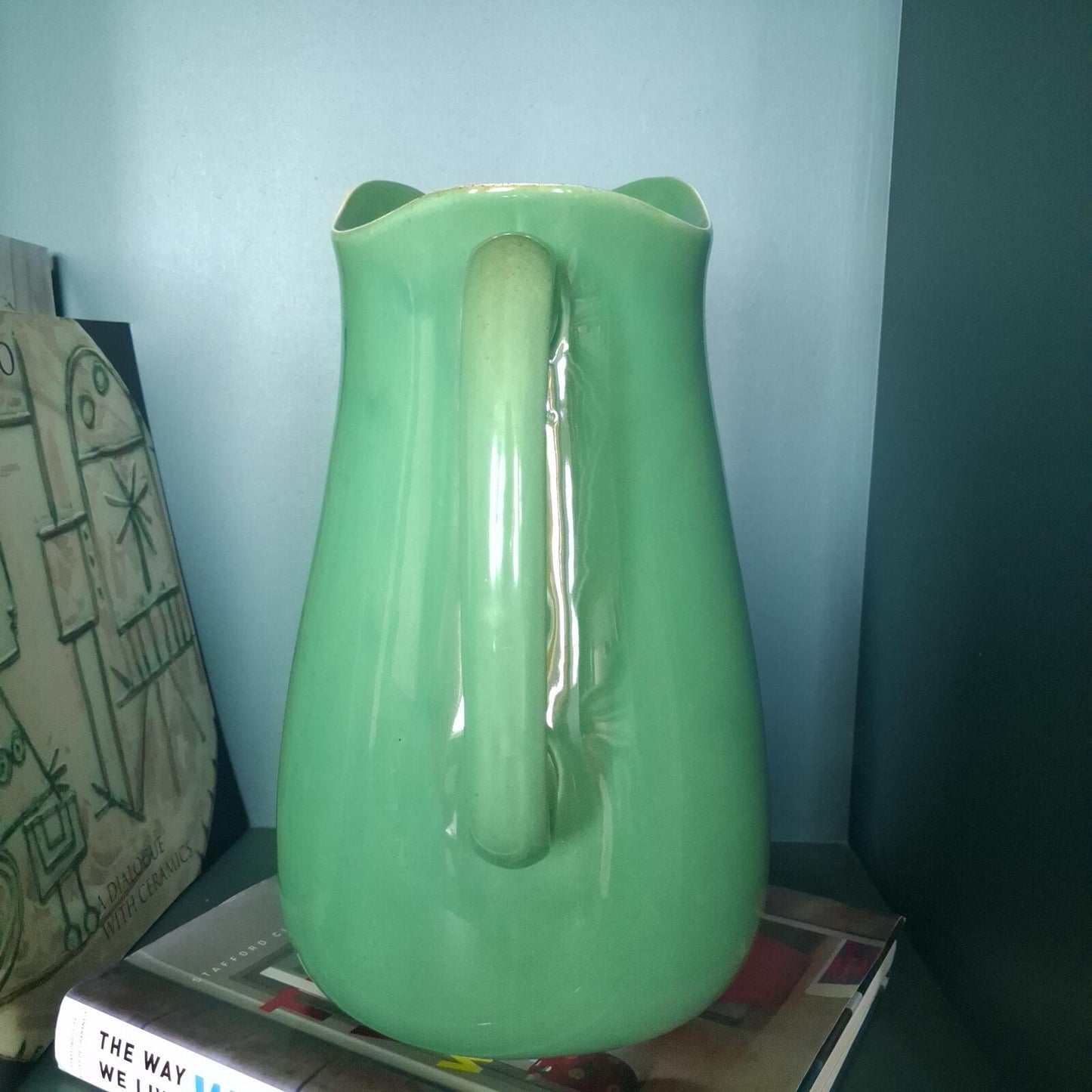 Large vibrant green pottery pitcher