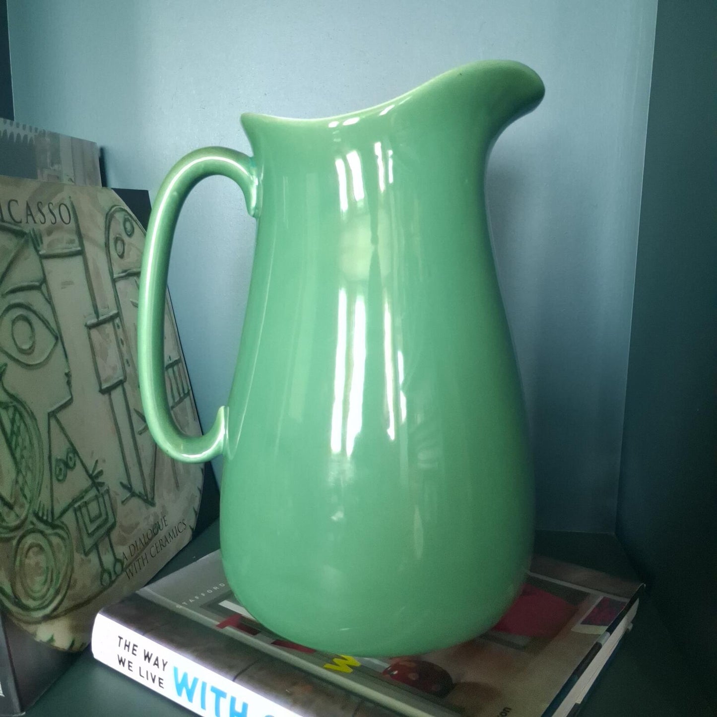 Large vibrant green pottery pitcher