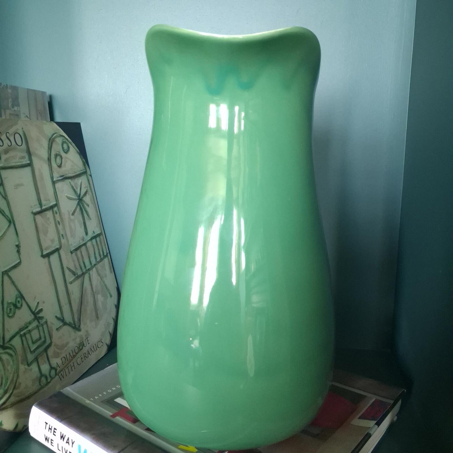 Large vibrant green pottery pitcher