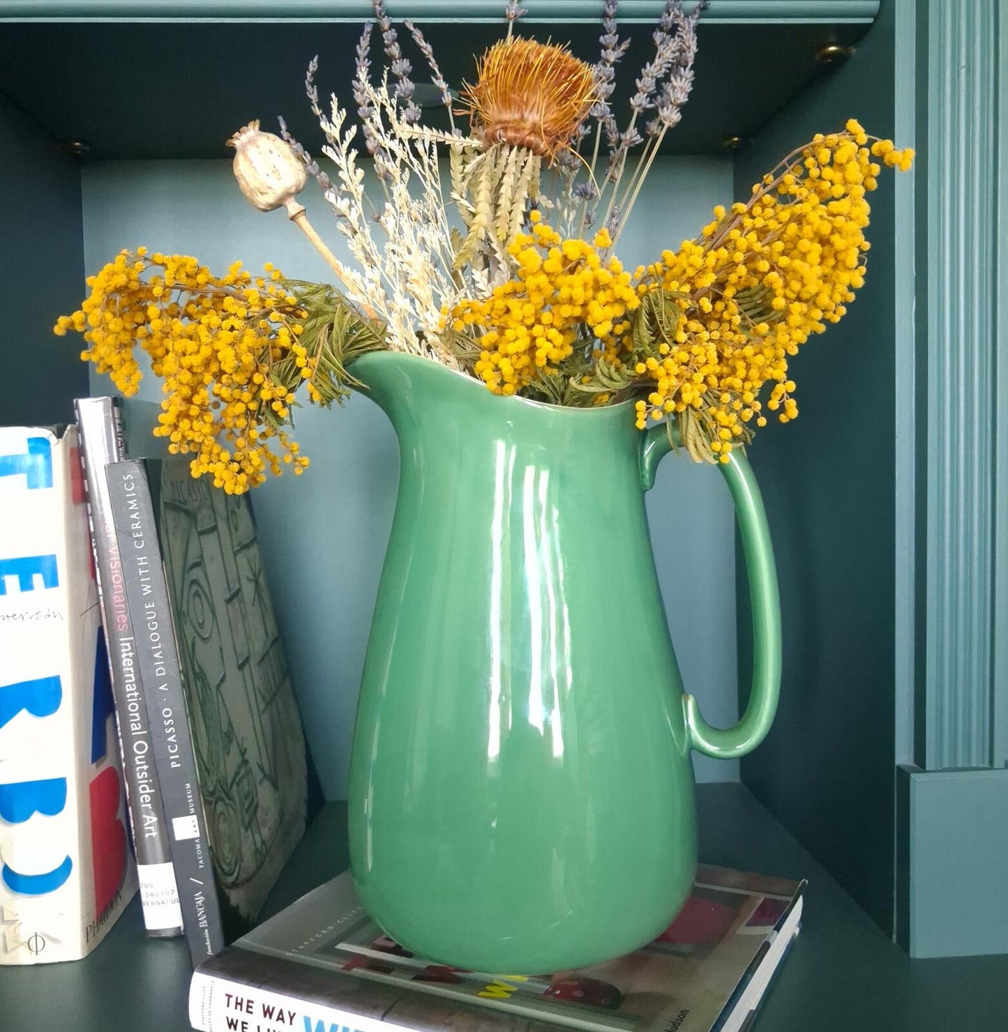 Large vibrant green pottery pitcher