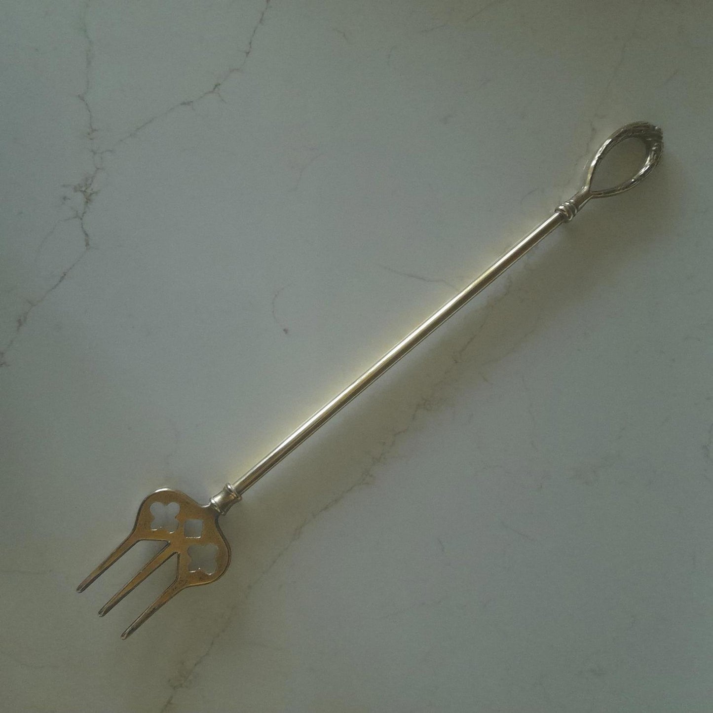 Long brass fireside hanging toasting fork