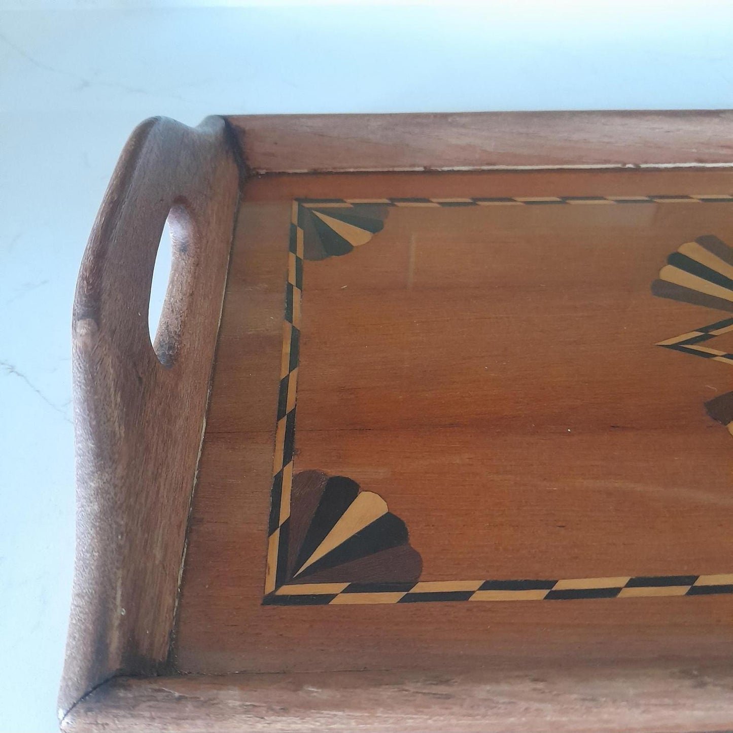 A vintage rectangular marquetry design serving tray