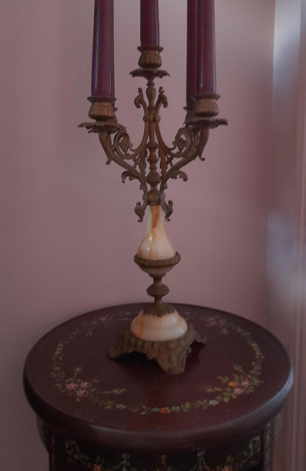 Brass and marble 4 arm candelabra with a central candleholder.