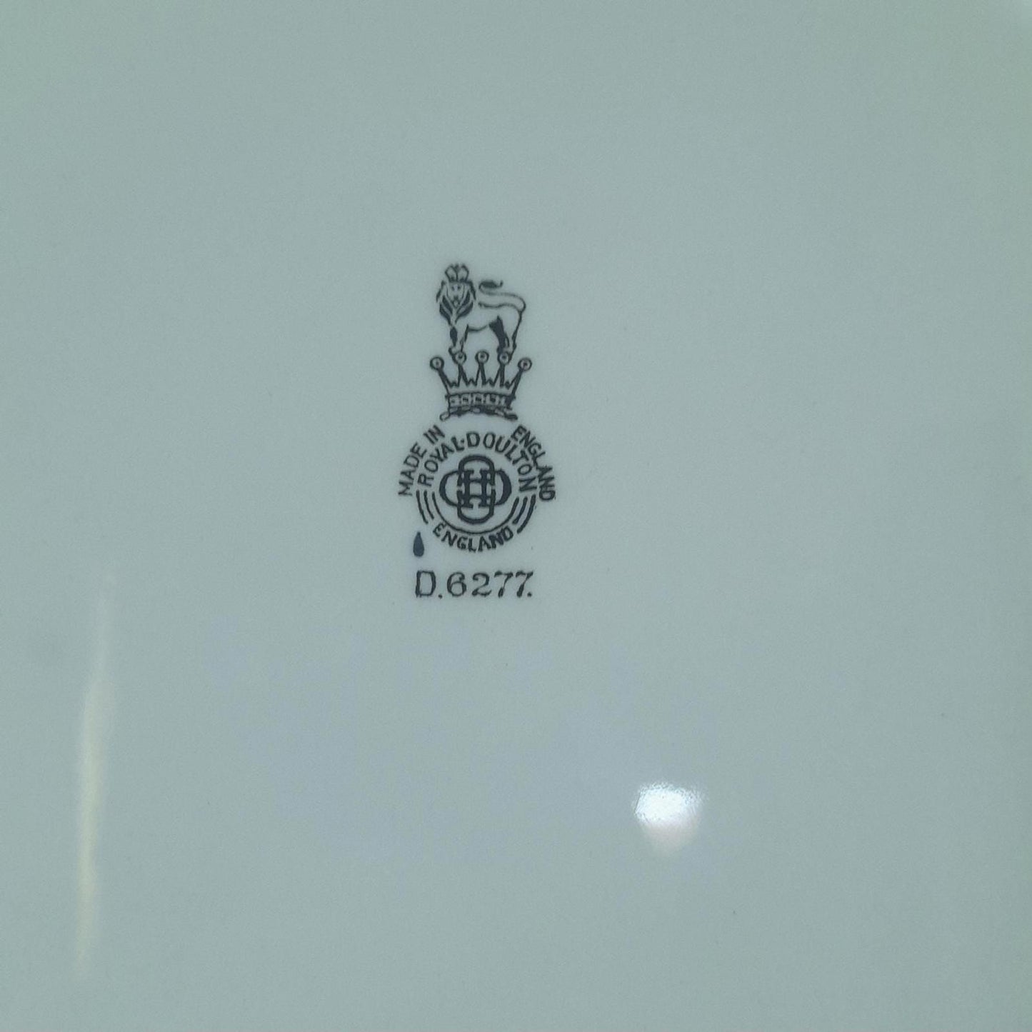 The Jester D 6277 Royal Doulton plate 10.25"
