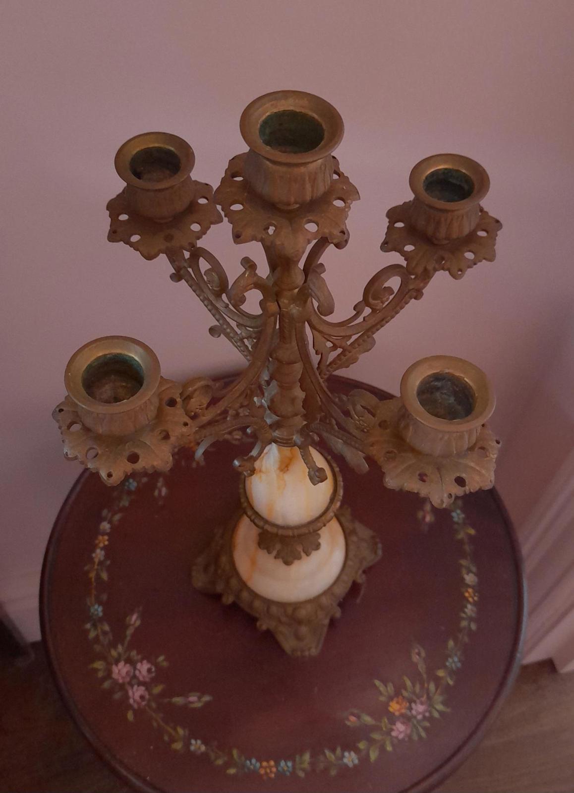 Brass and marble 4 arm candelabra with a central candleholder.