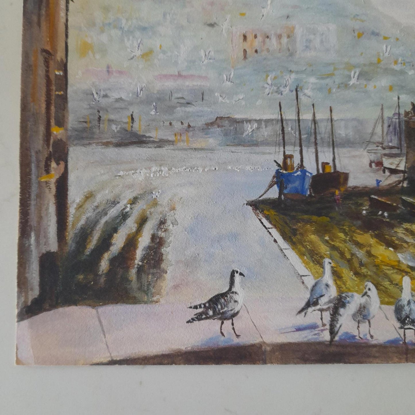 An original painting of a coastal harbor scene by the artist A F Akehurst.