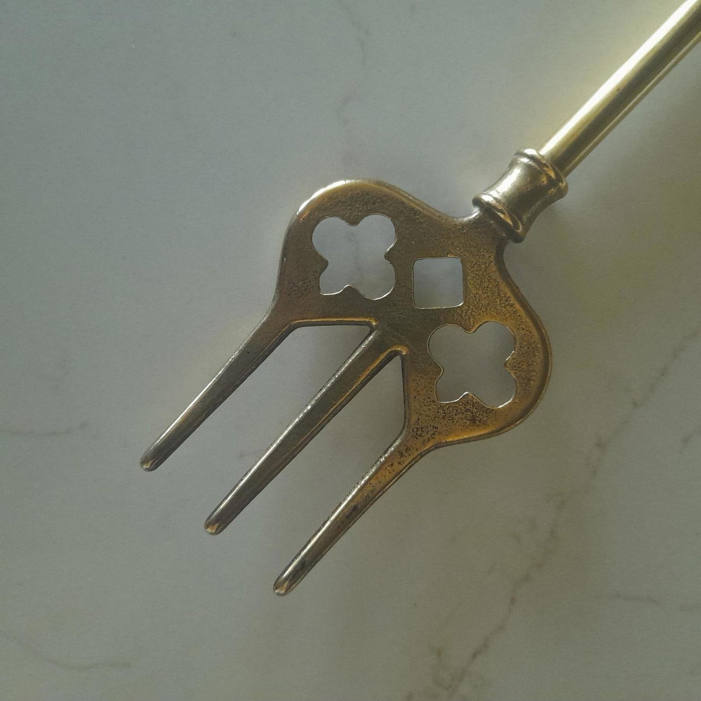 Long brass fireside hanging toasting fork