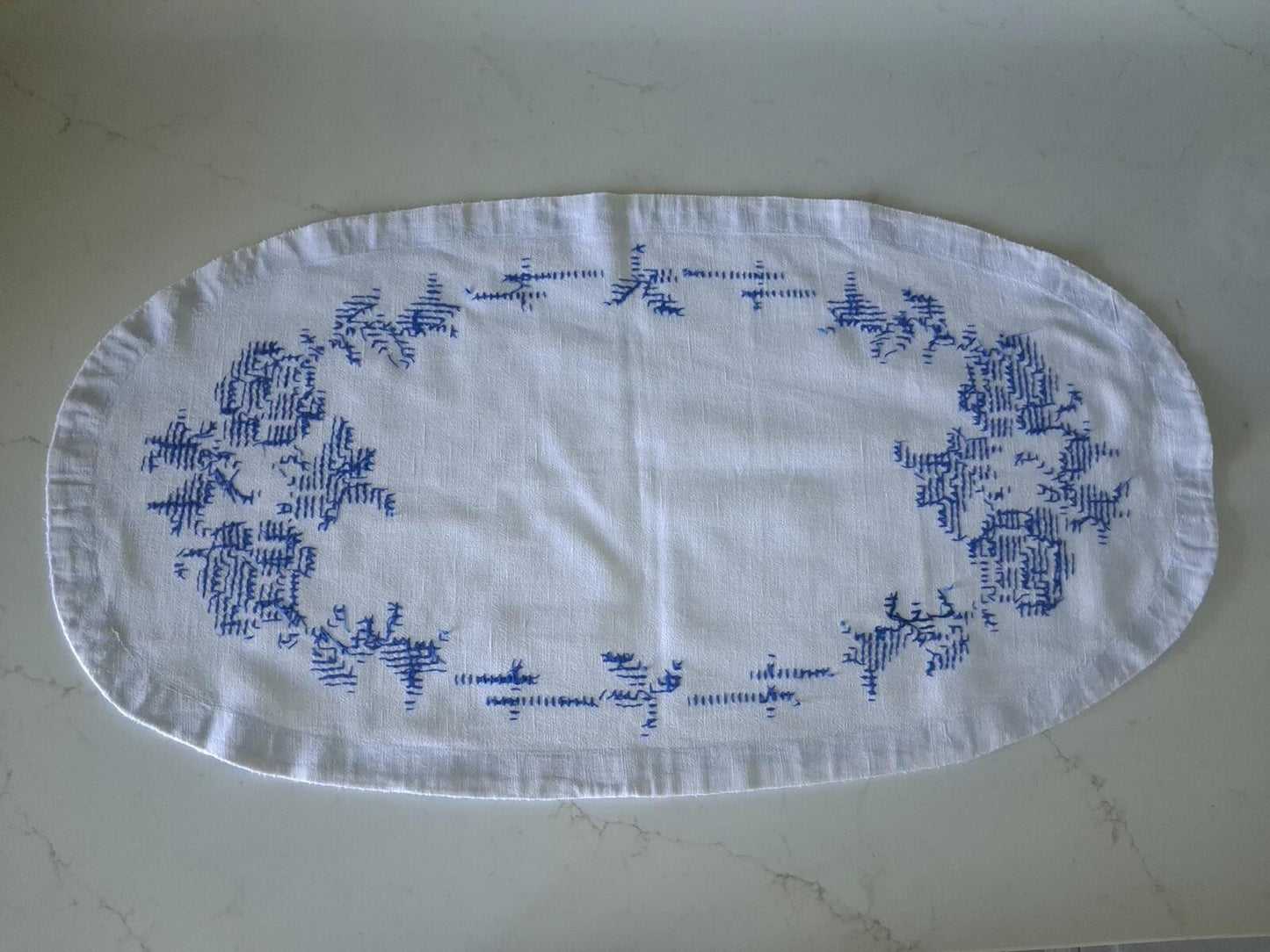 Oval blue and white cross stitch centrepiece cloth 65cm x 34.5cm