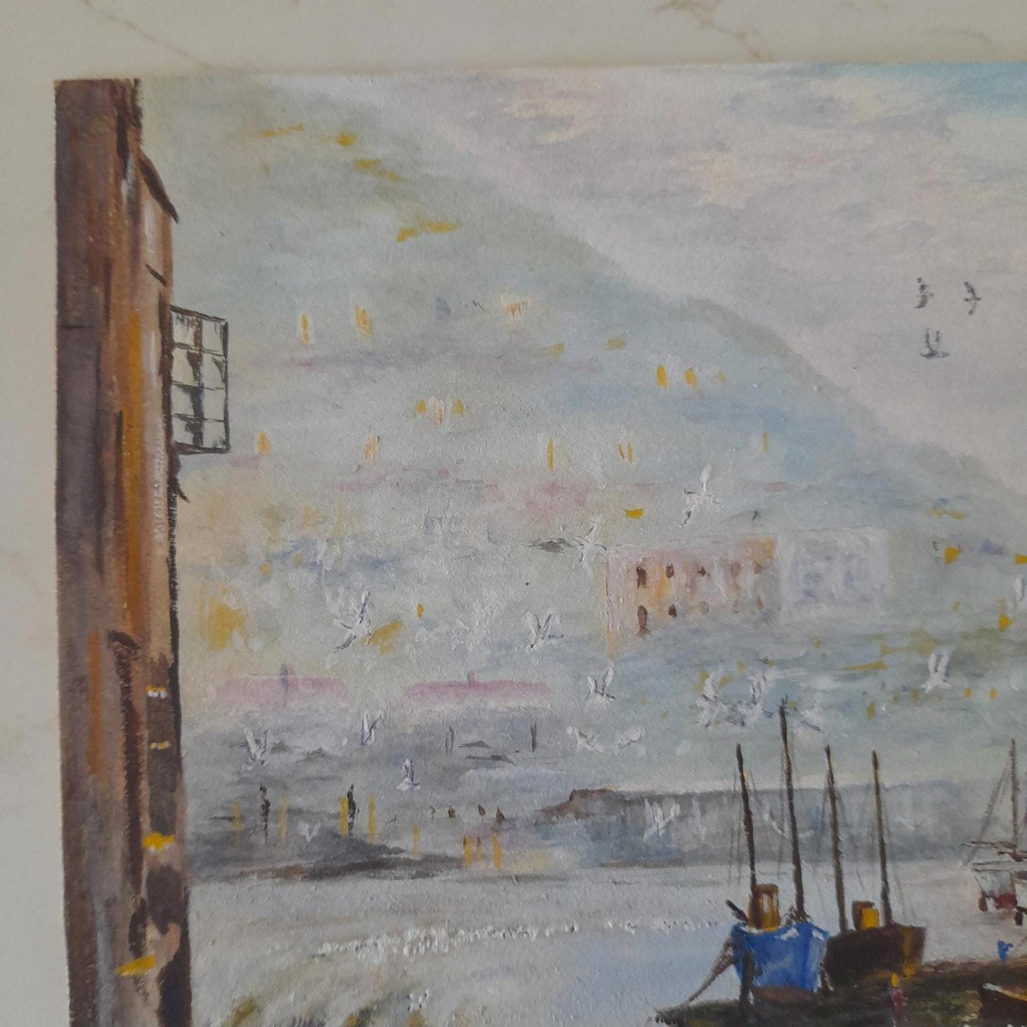 An original painting of a coastal harbor scene by the artist A F Akehurst.