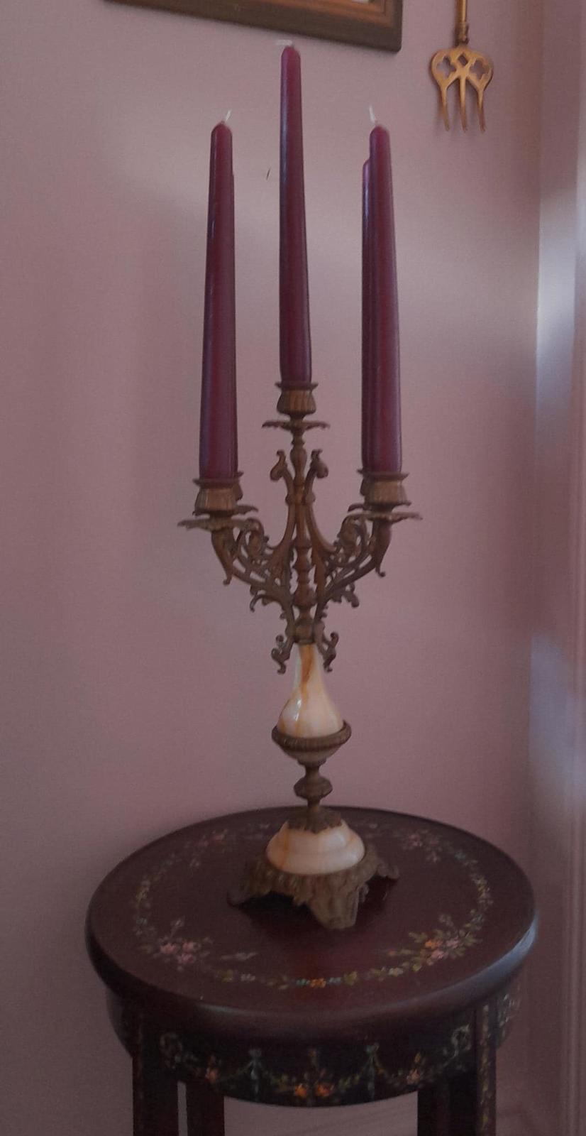 Brass and marble 4 arm candelabra with a central candleholder.