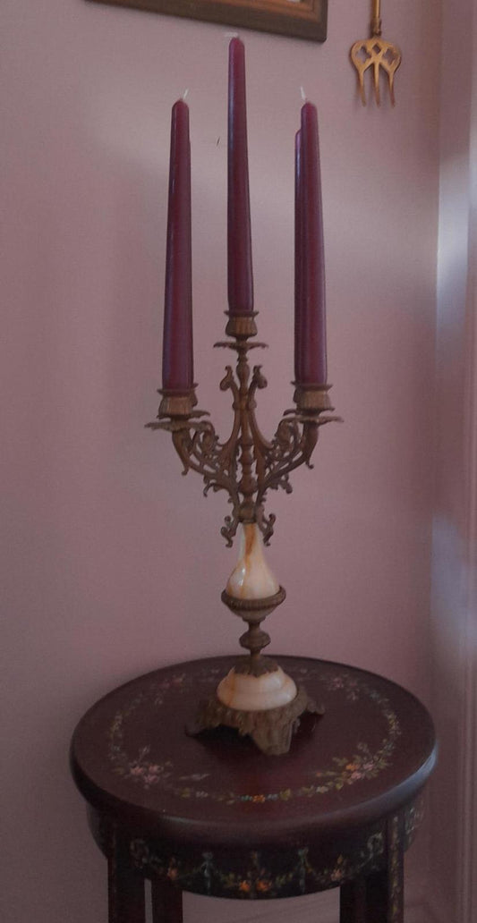 Brass and marble 4 arm candelabra with a central candleholder.