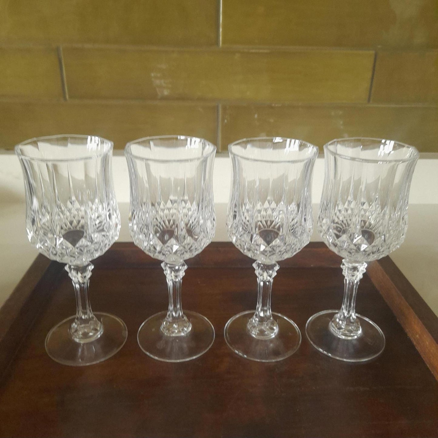 Royal Doulton decanter, longchamp glasses & a silver plated tray.