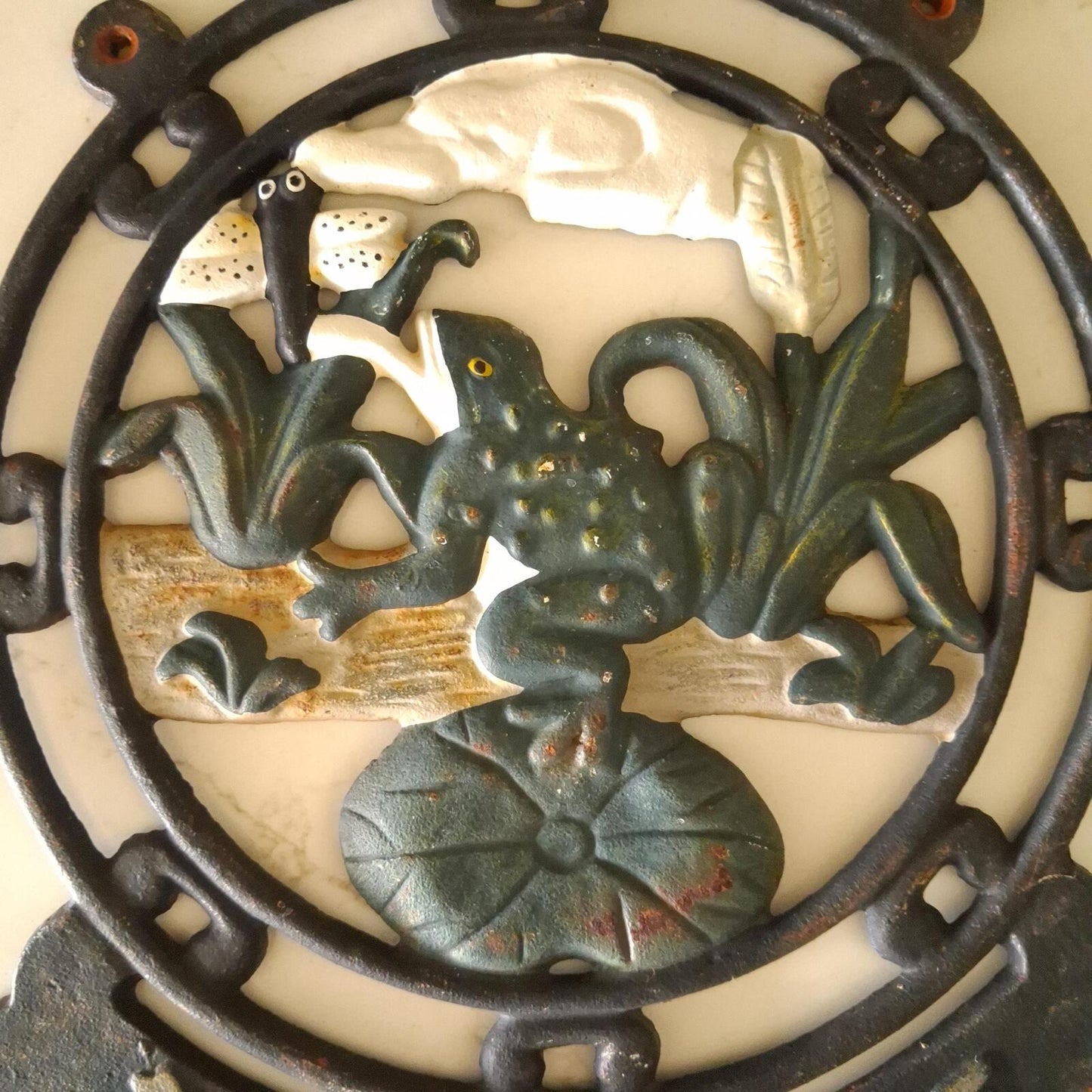 A vintage cast iron Bienvenue (Welcome) wall mountable sign.