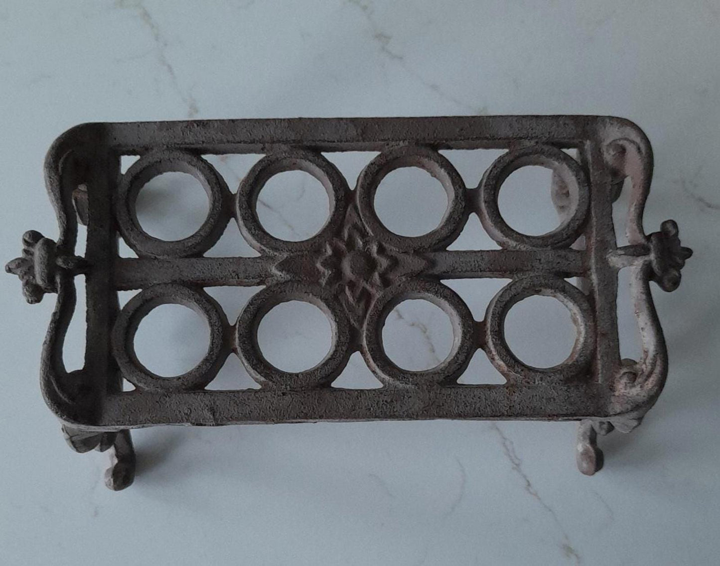 Rustic brown cast iron garden cuttings holder - it will need glass test tubes