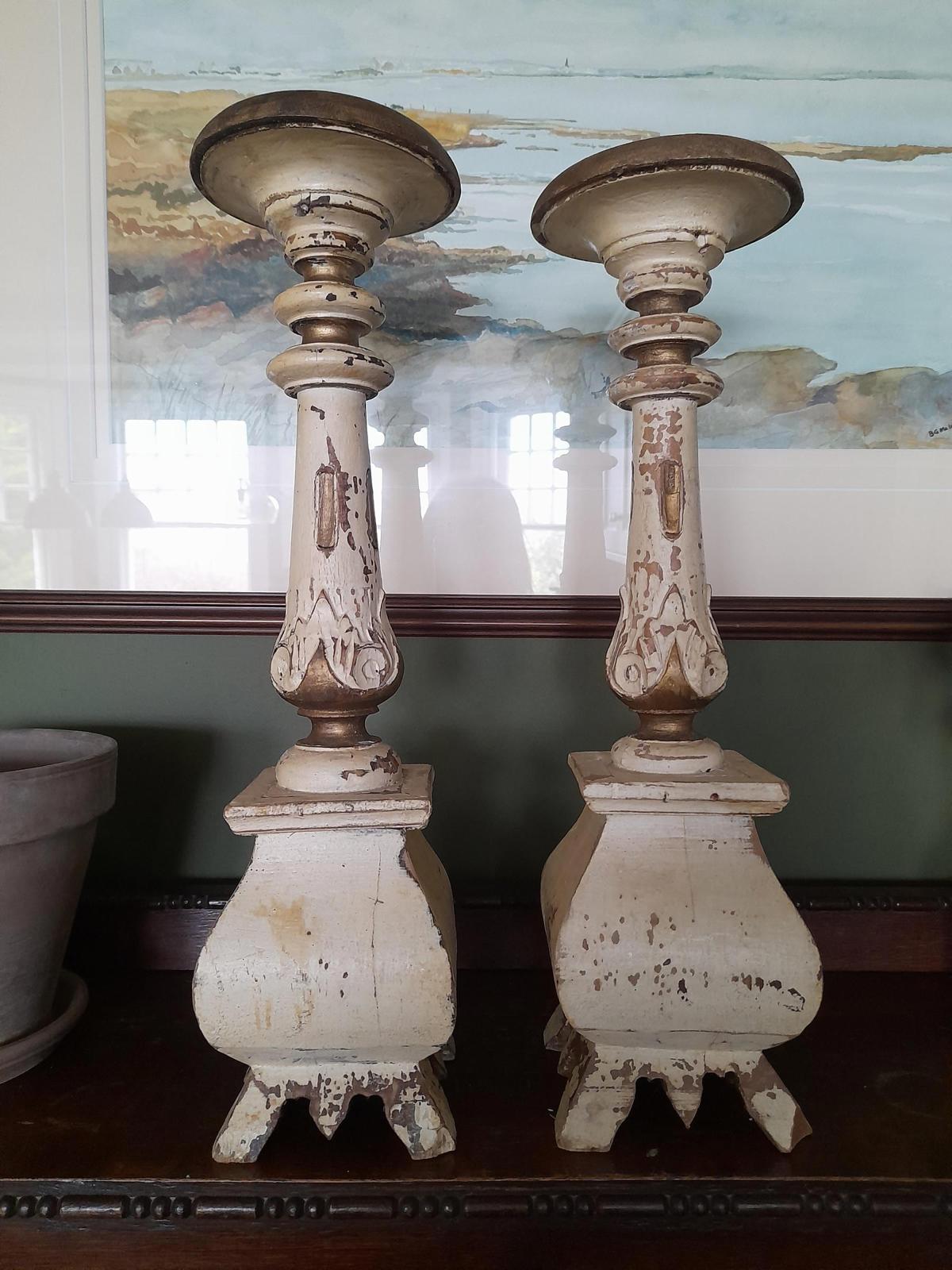 A pair of antique Swedish painted handmade wooden candlesticks c 1870