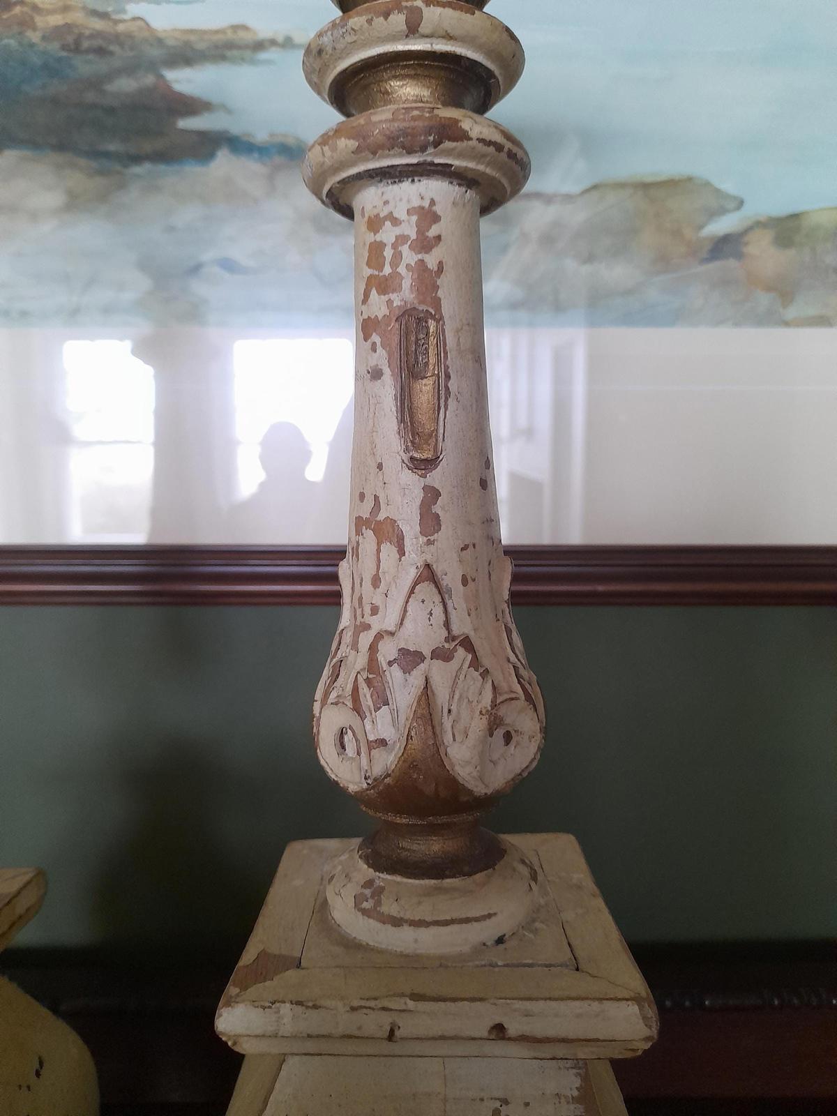 A pair of antique Swedish painted handmade wooden candlesticks c 1870