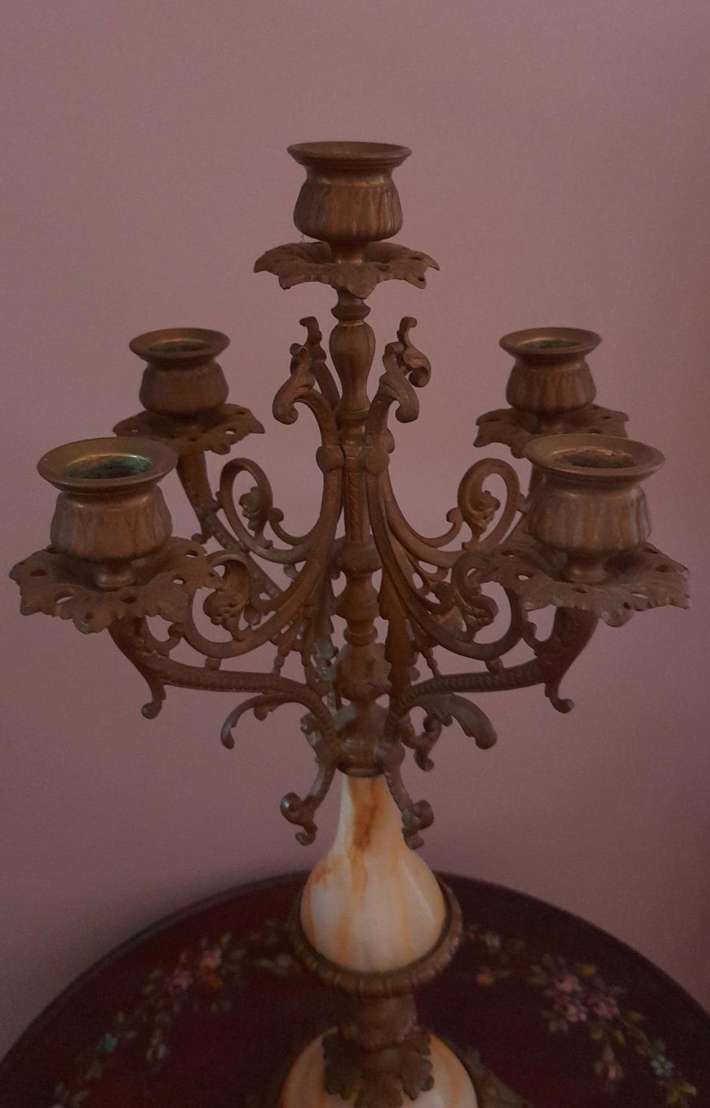 Brass and marble 4 arm candelabra with a central candleholder.