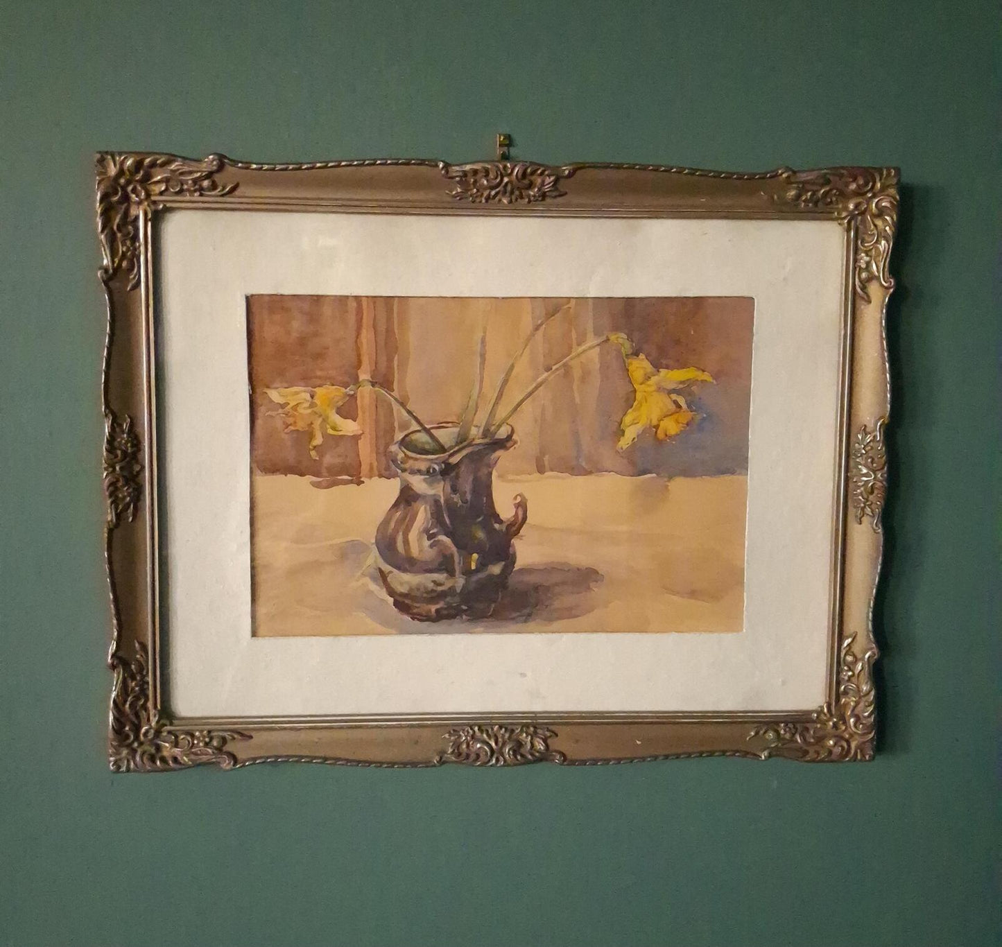 Framed watercolour in an ornate frame