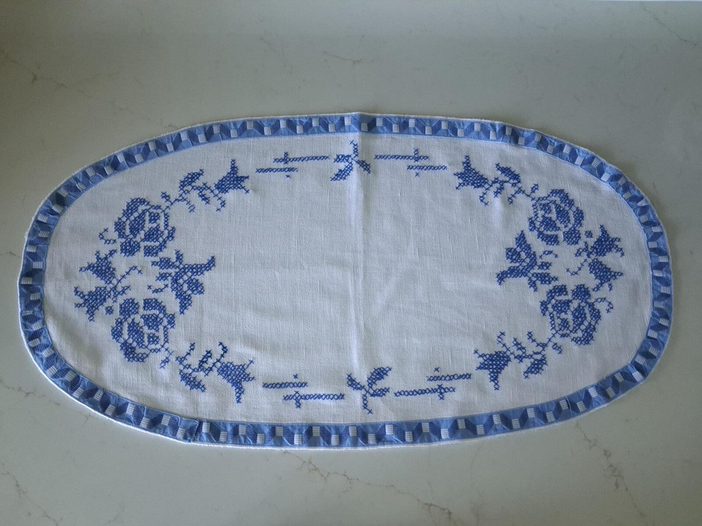 Oval blue and white cross stitch centrepiece cloth 65cm x 34.5cm
