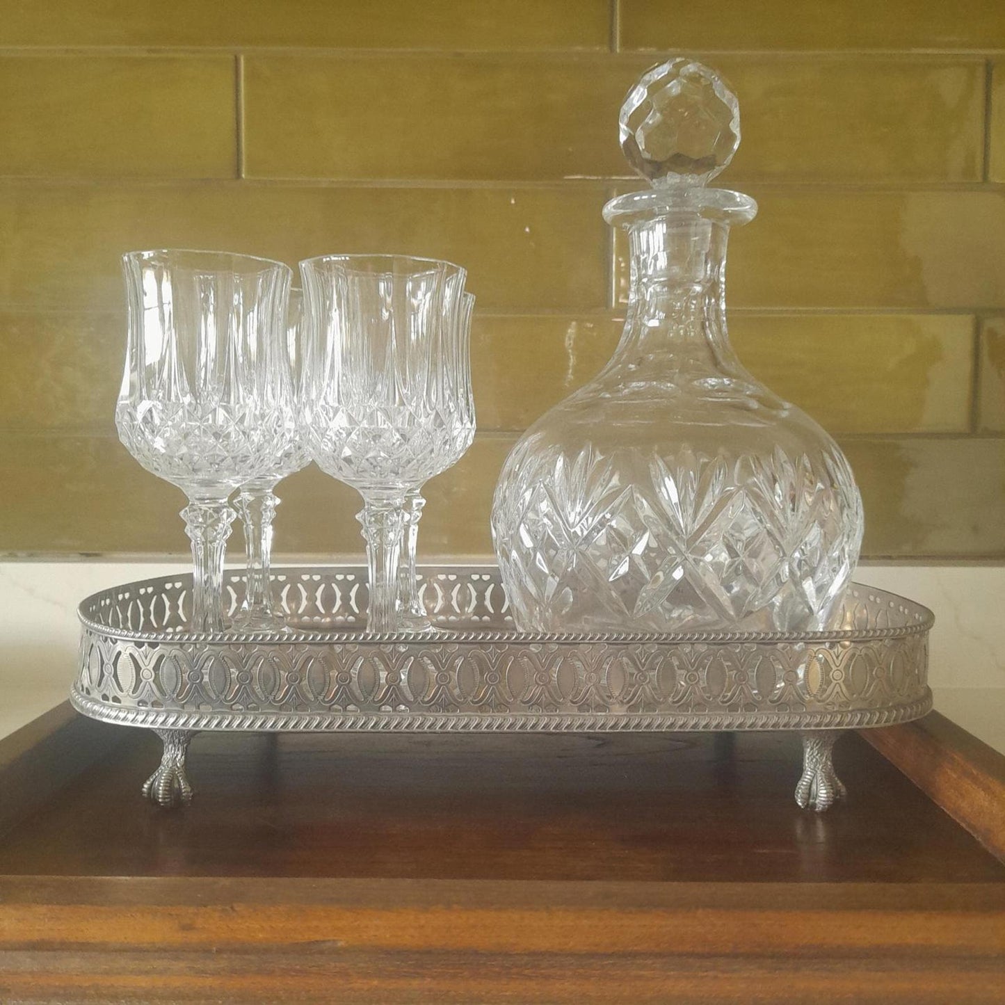 Royal Doulton decanter, longchamp glasses & a silver plated tray.
