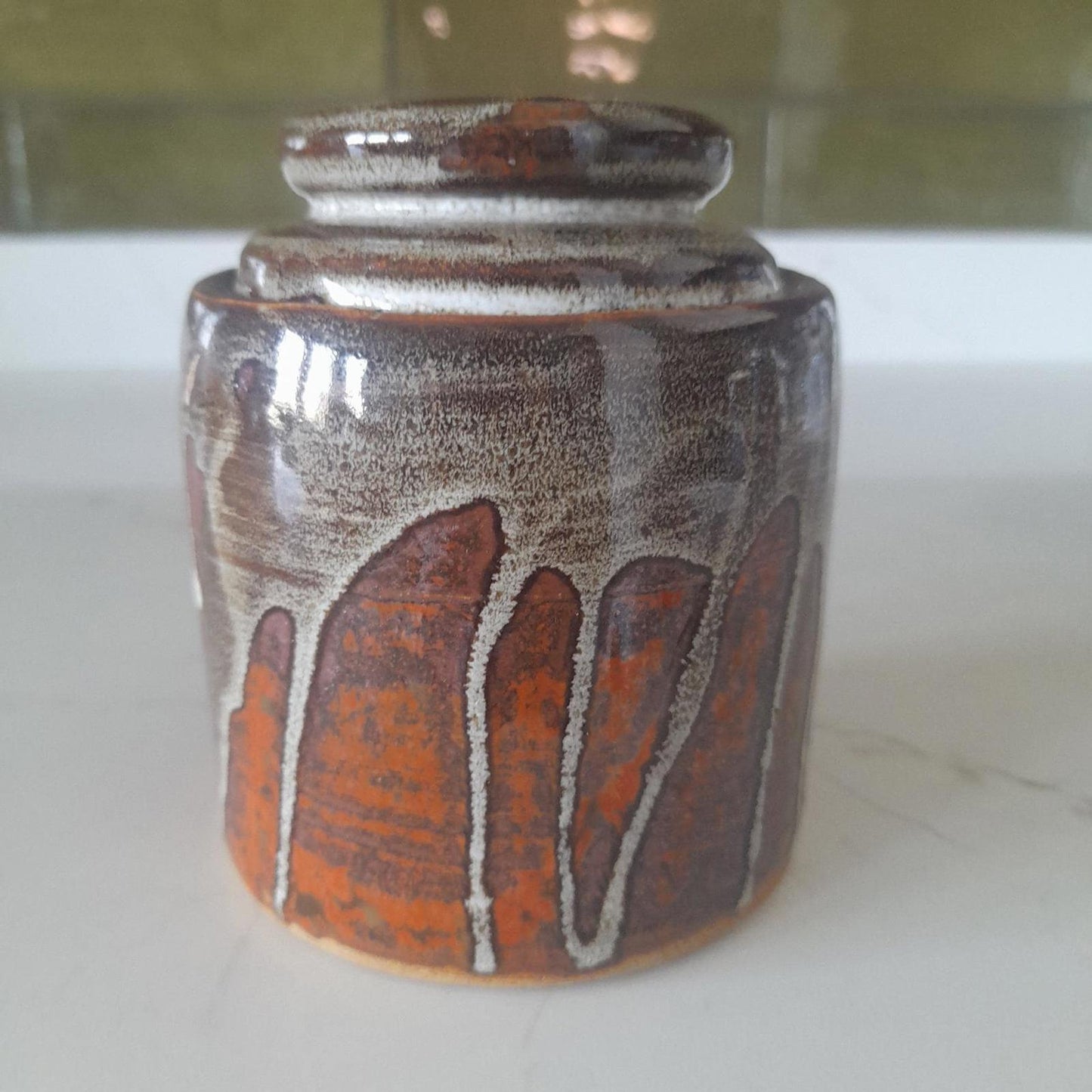 Studio pottery drip glaze lidded jar