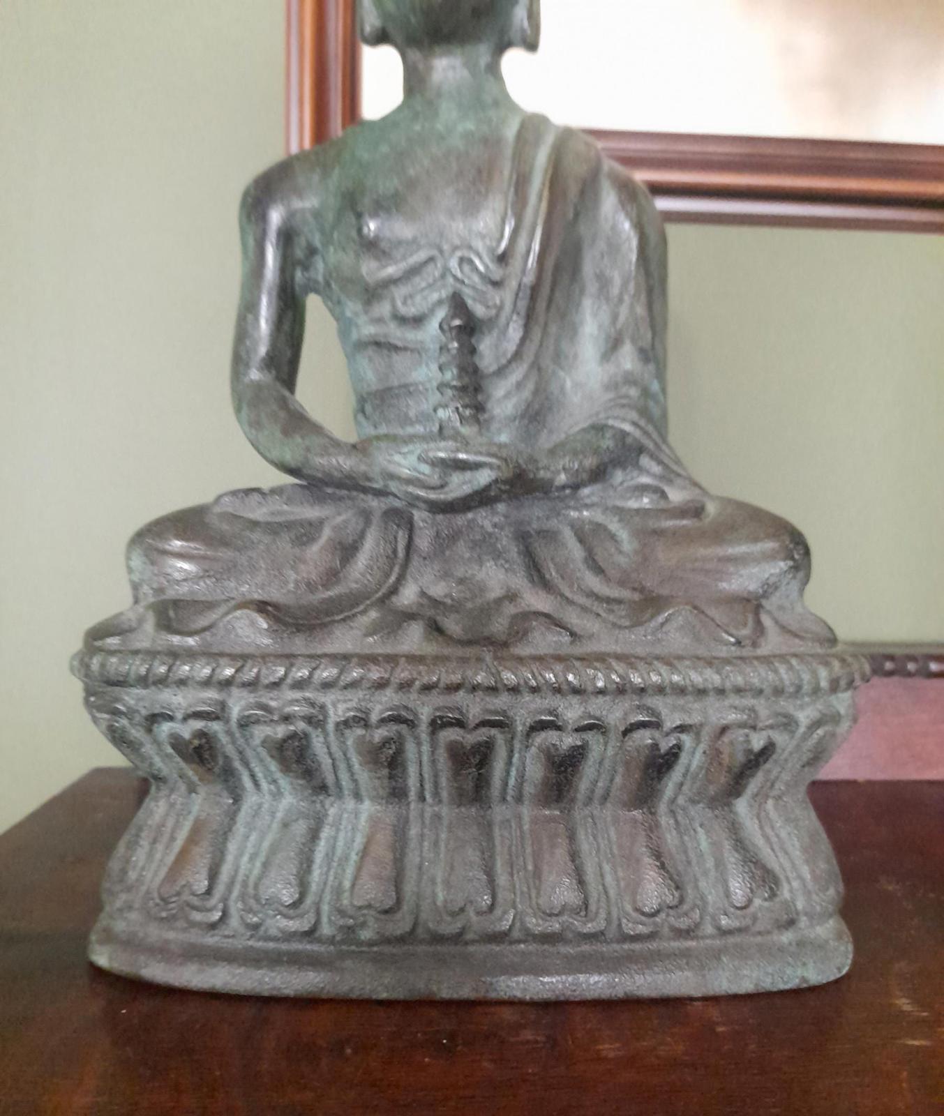 Tibetan bronze figure of a Buddha seated in the lotus position