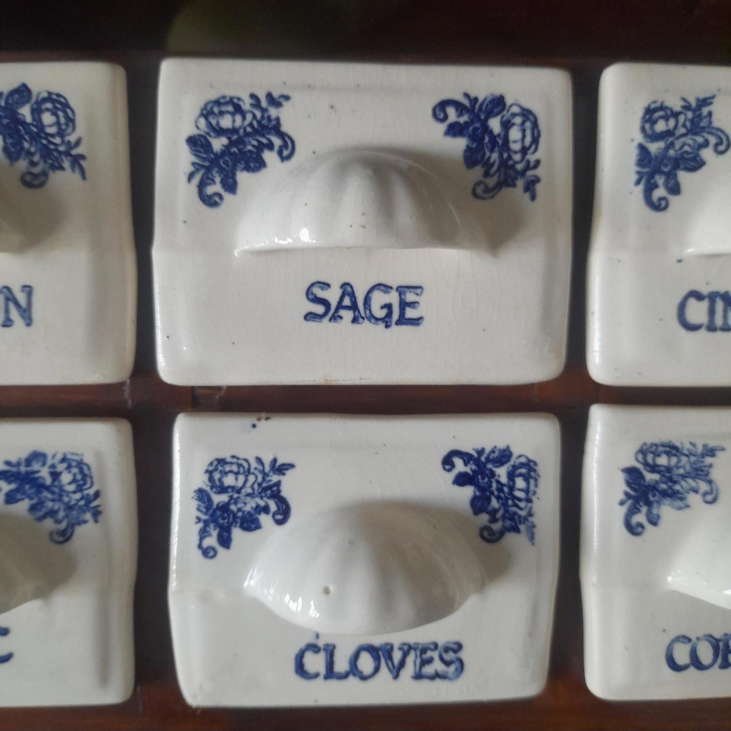 Vintage wooden spice rack with 12 ceramic drawers
