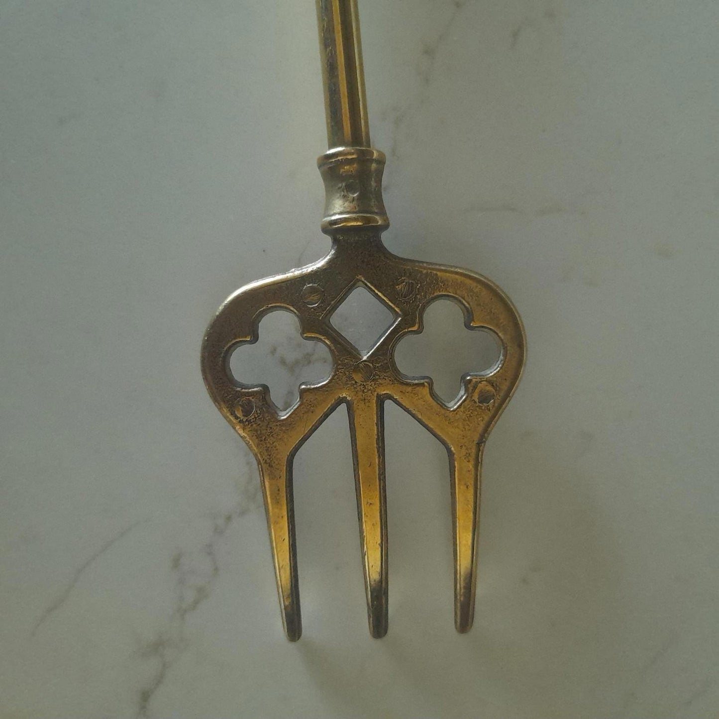 Long brass fireside hanging toasting fork