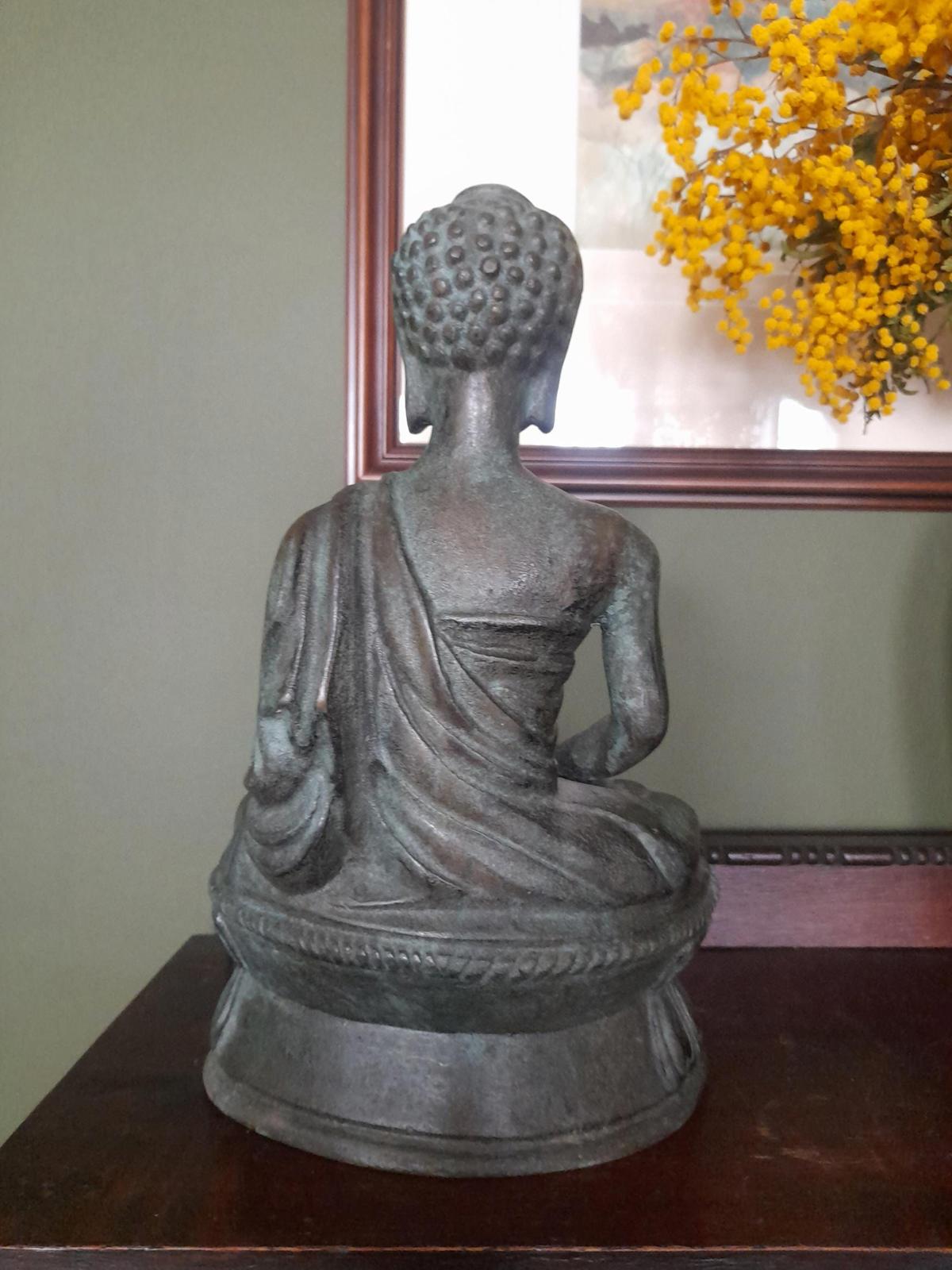 Tibetan bronze figure of a Buddha seated in the lotus position
