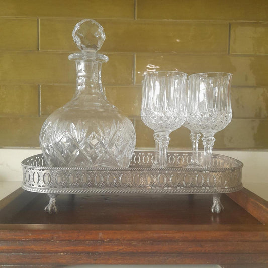 Royal Doulton decanter, longchamp glasses & a silver plated tray.