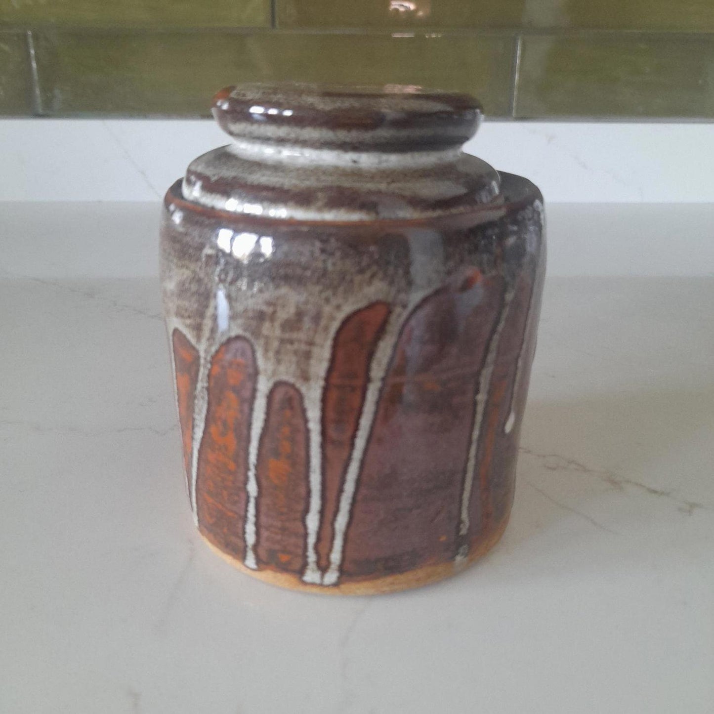 Studio pottery drip glaze lidded jar