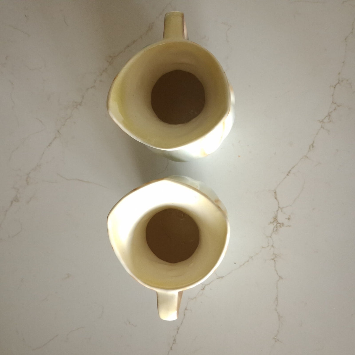 A pair of Vintage Falcon Ware Art Deco Jugs, with a brown, cream and blue glaze
