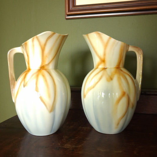 A pair of Vintage Falcon Ware Art Deco Jugs, with a brown, cream and blue glaze
