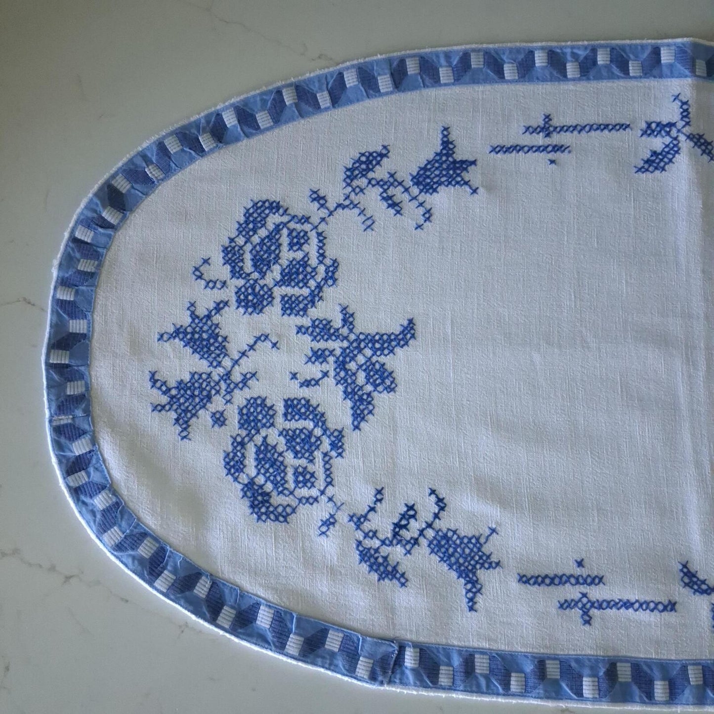 Oval blue and white cross stitch centrepiece cloth 65cm x 34.5cm