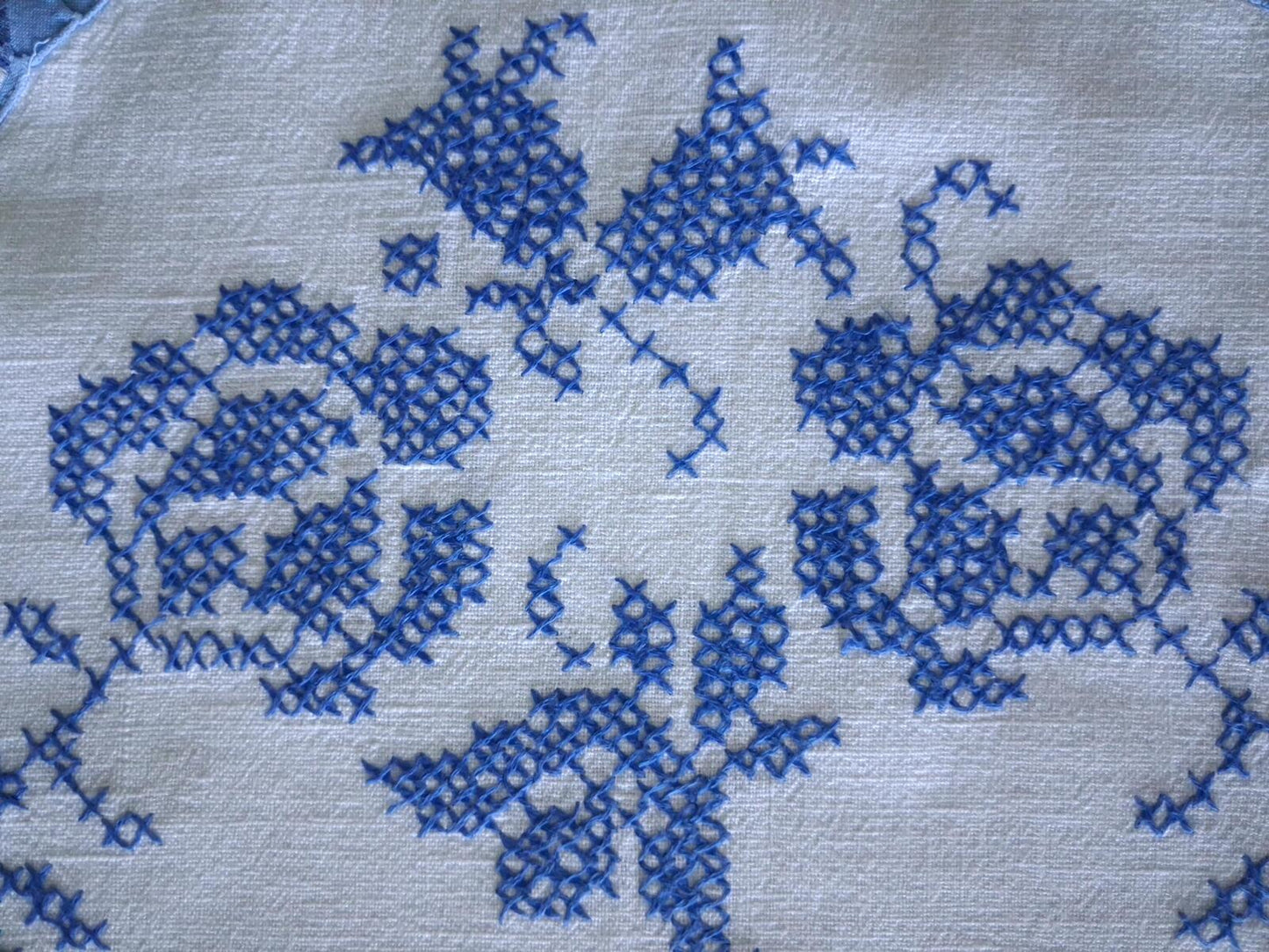 Oval blue and white cross stitch centrepiece cloth 65cm x 34.5cm