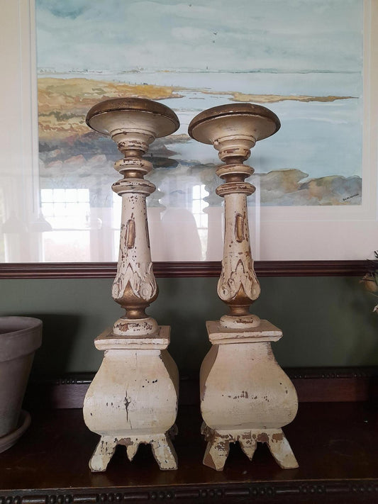 A pair of antique Swedish painted handmade wooden candlesticks c 1870