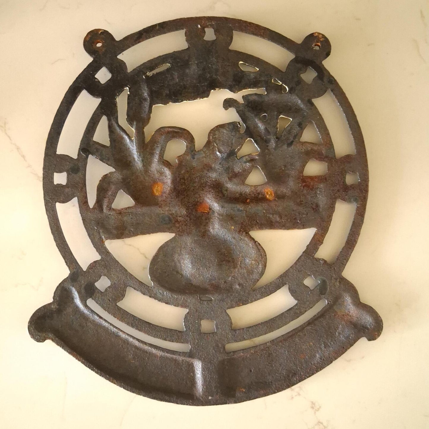 A vintage cast iron Bienvenue (Welcome) wall mountable sign.