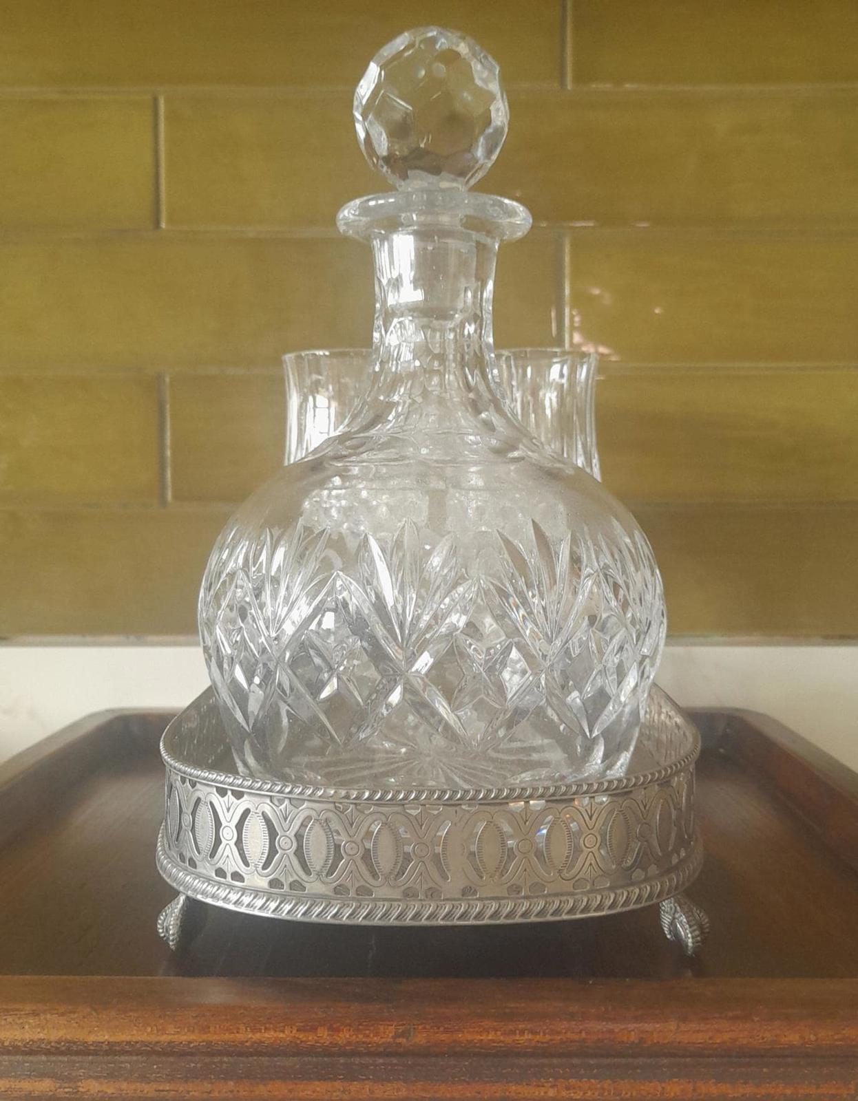 Royal Doulton decanter, longchamp glasses & a silver plated tray.