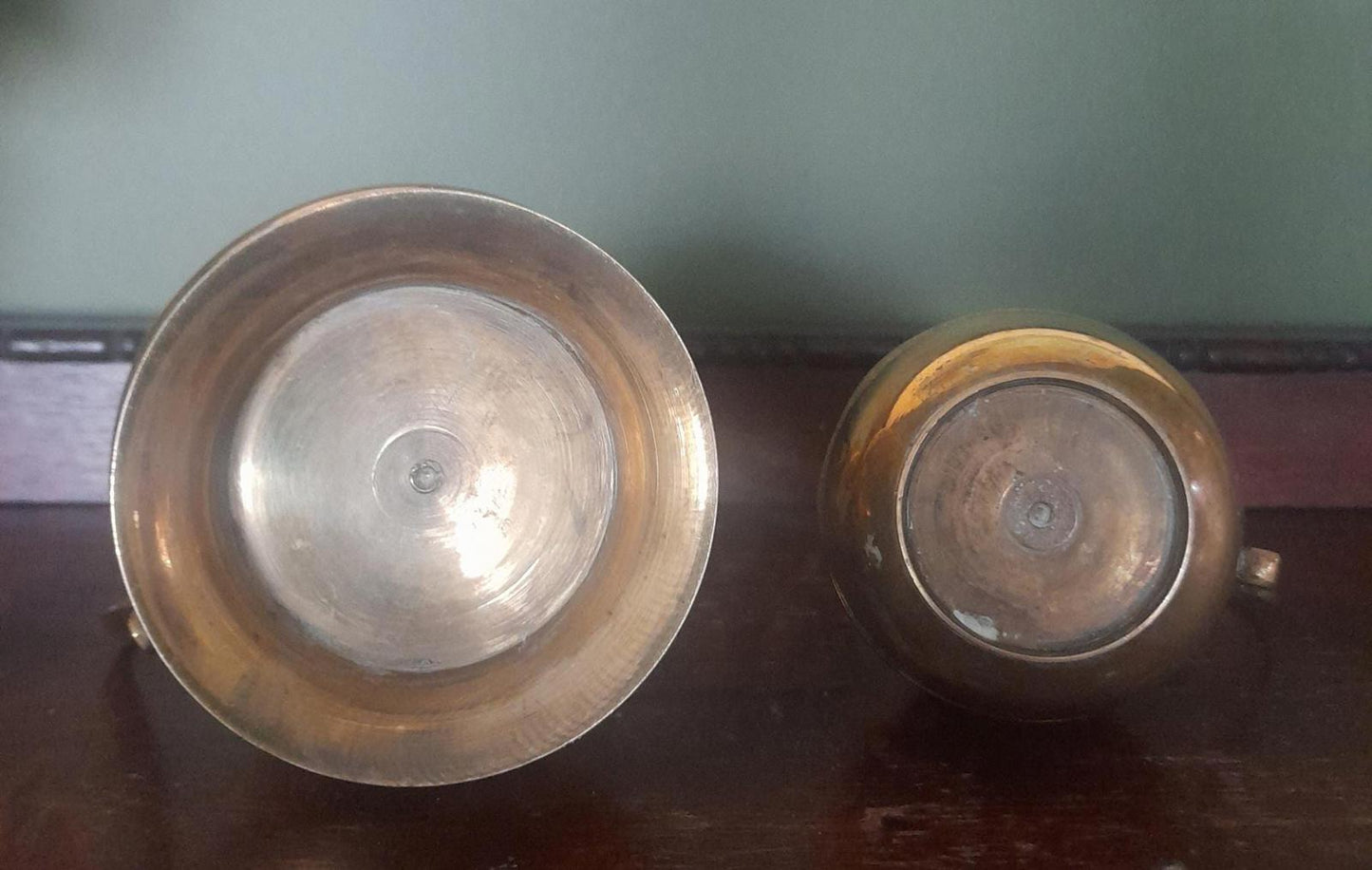 A pair of small brass jugs 5" tall