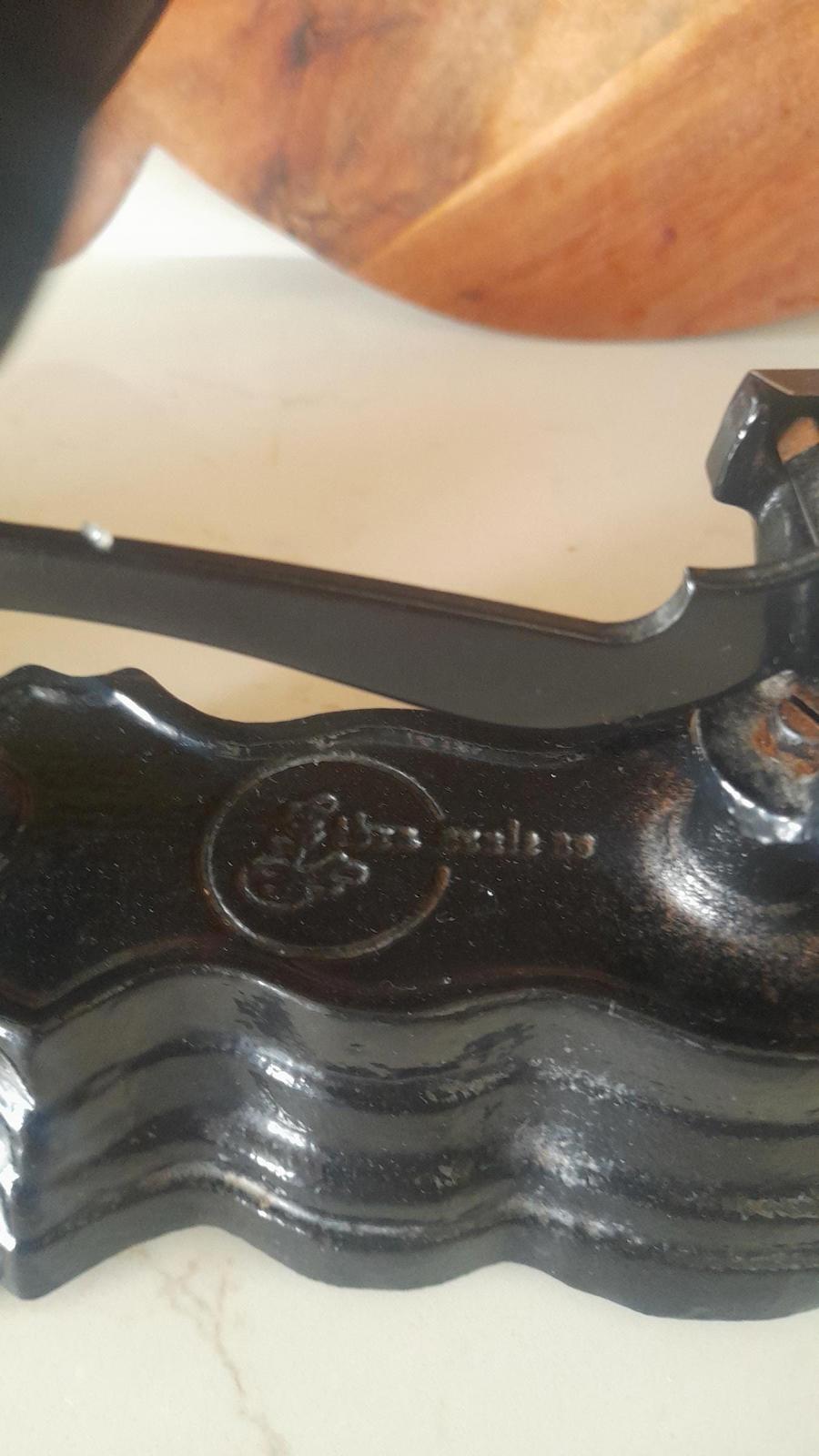 Vintage Black cast iron and brass Libra scales with 7 Bell weights.